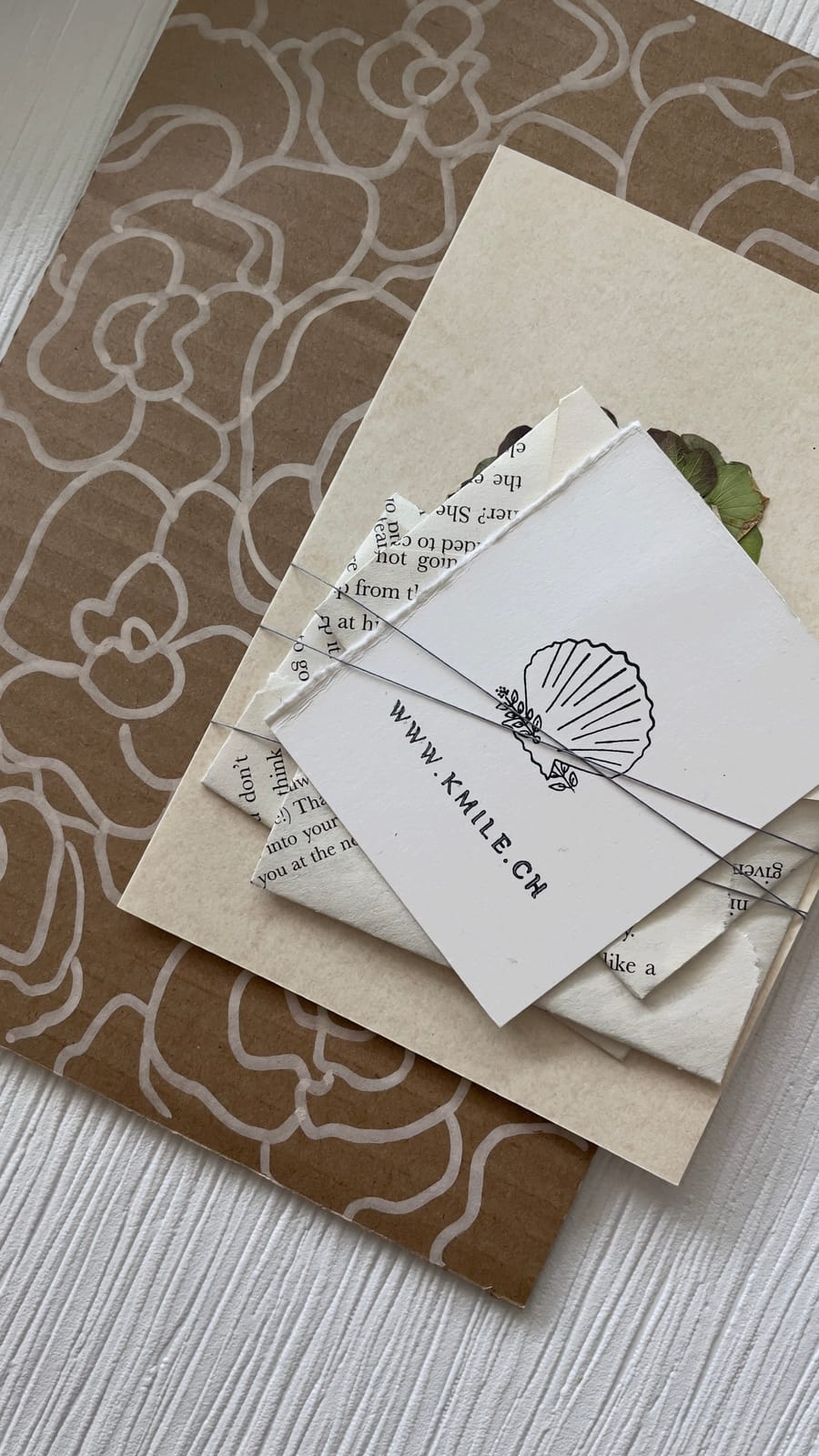A minimal, neutral paper mood board flatlay